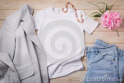 Women T-shirt mockup with jeans and striped blazer Stock Photo